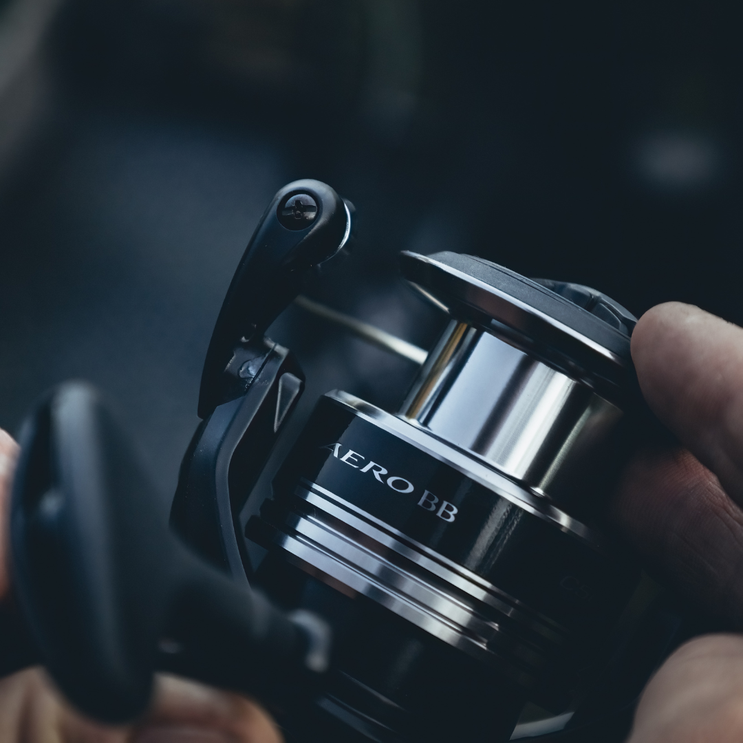 Detailed view of the Shimano Aero BB C5000 reel, focusing on the Aero BB branding and polished metal spool.