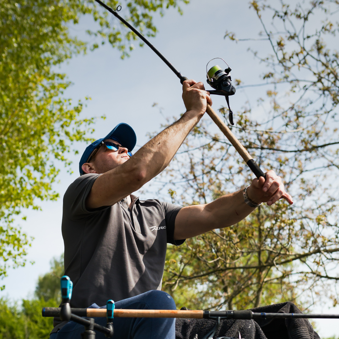 Angler casting a fishing rod equipped with the Shimano Aero BB C5000 reel, demonstrating its smooth and efficient performance.