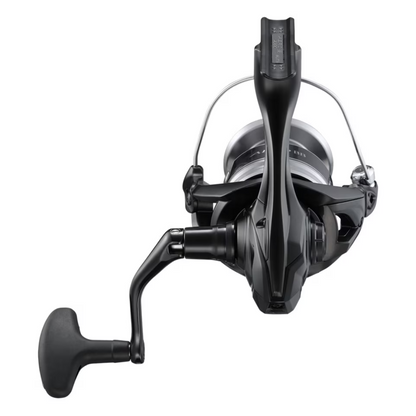 Rear view of Shimano Aero BB C3000 spinning reel, emphasizing its robust build and comfortable grip handle.